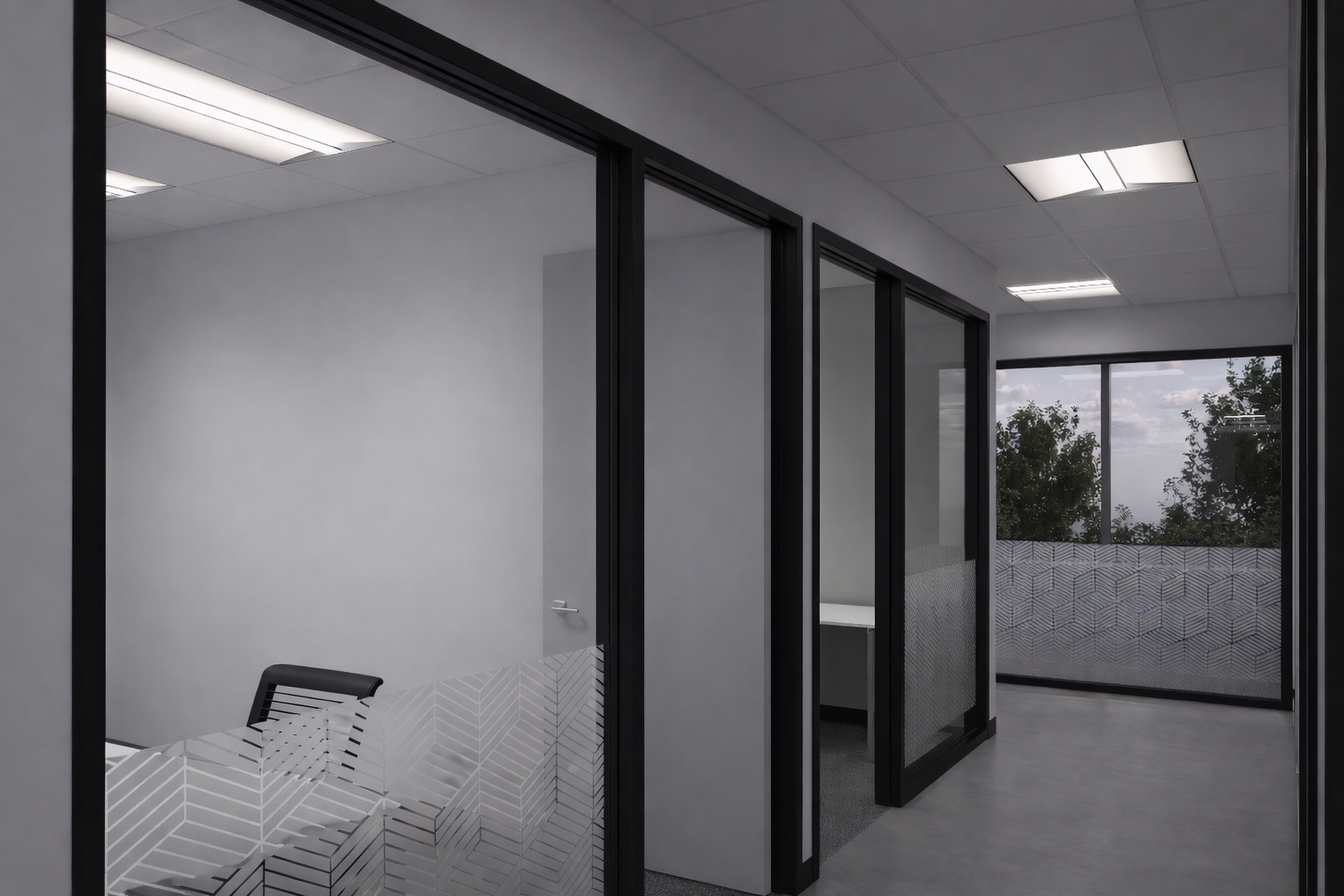 Private glass-walled offices at Spaces Royal Overlook